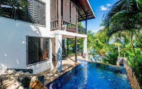 4-Bedroom Cliffside Home with Pool on Secluded Beach